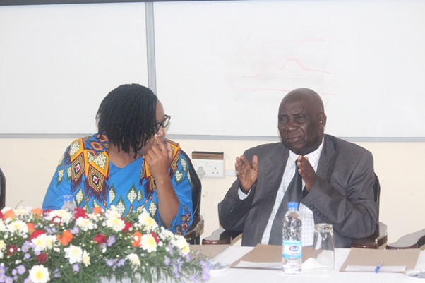 Prof. C. Mararike (right) responding to questions after presenting on the tool kit for professional conduct while Prof C. Manyeruke (left) listens attentively